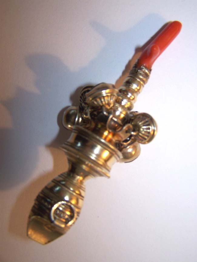 A Fine late 18th century Silver-Gilt Child's Rattle, Whistle and Bells with Coral Stem.